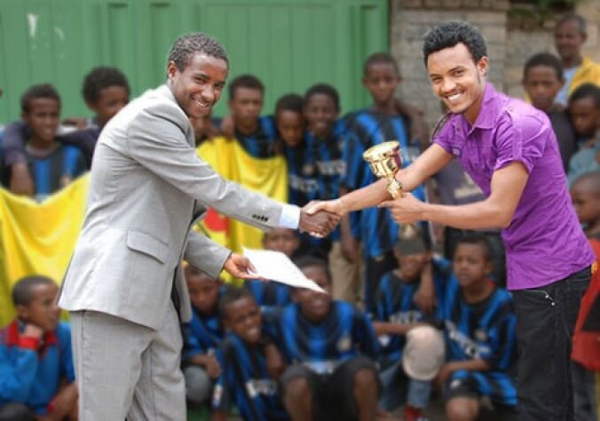 EYES Student Coach Haftom Desta accepts Mekelle City League Cup for his winning EYES under-14 team. Our Under-16 team came third. Haftom, the youngest coach was also awarded “Top City League Coach” and a place on a Coaches Training Course.